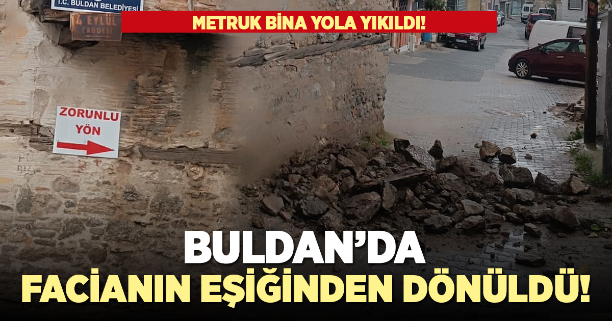 Buldan'da metruk binanın duvarı yola yıkıldı!