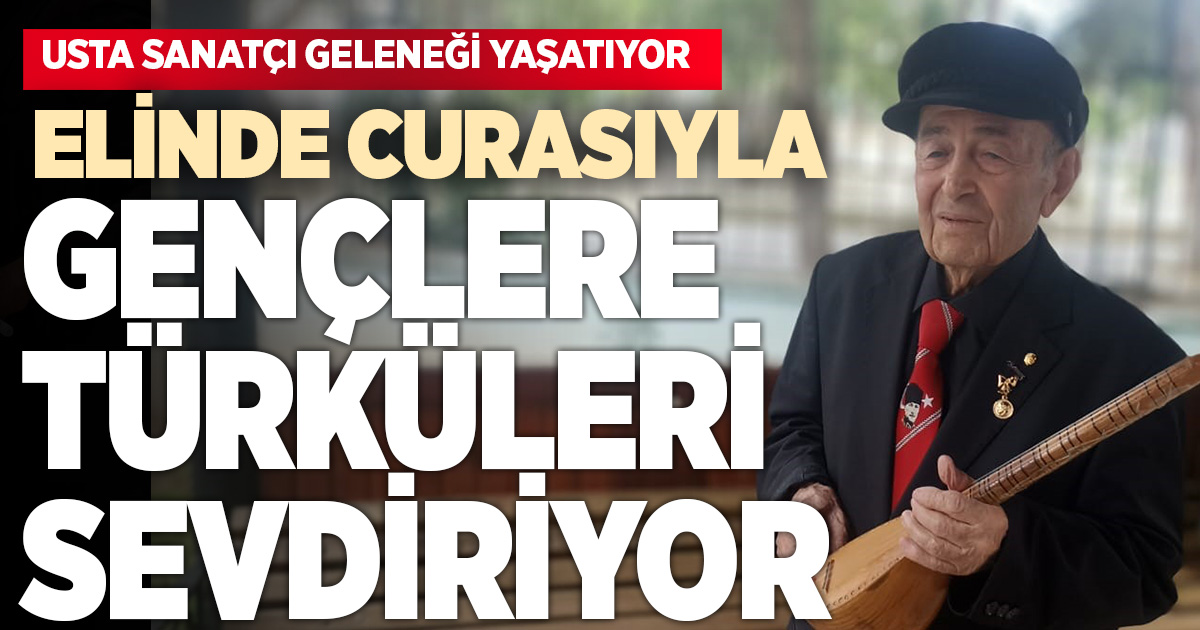 ELİNDE CURASIYLA GENÇLERE TÜRKÜLERİ SEVDİRİYOR