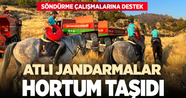 Atlı jandarmalar yangın bölgesine hortum taşıdı